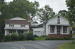 Houses at the community's central intersection