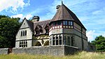 The Cottage about 100m North-east of Church of St Mary with front Garden Wall and Gate