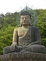 Buda Perunggu Sinheungsa (Candi Buda) deukeuteun panto asup ka Taman Nasional Séoraksan.