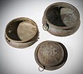 Bronze bowls and wine strainer with triskele design from Langstone, Newport.[54]