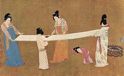 Ladies making silk, early 12th century painting by Emperor Huizong of Song (a remake of an 8th century original by artist Zhang Xuan), illustrates silk fabric manufacture in China.