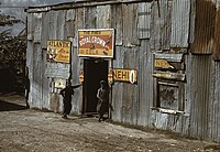 Negro migratory workers by a juke joint