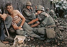 A marine gets his wounds treated during operations in Hue City, in 1968 OperationHueCity1967wounded.jpg