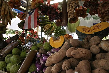 Vegetable display at festival Fiesta Acabe del Café in Maricao