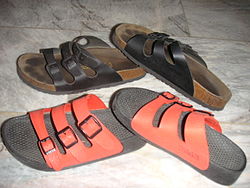 Pairs of Birkenstocks (original in the back, copy in the front)