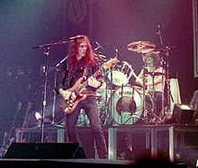 Phil Taylor (vpravo) a "Fast" Eddie Clarke v roce 1982