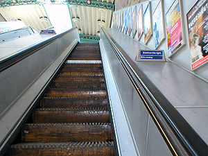 Going up the last wooden escalator on the Lond...