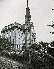 The school's first permanent building photographed in 1905