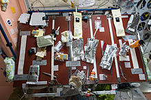 Main dining desk in Node 1 ISS-43 Food table in the Unity module.jpg