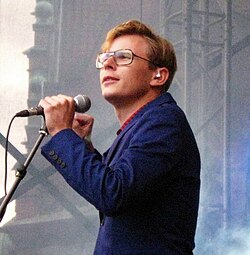 Man holding microphone on stage