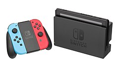 Ovladač Joy-Con a konzole Nintendo Switch v dokovacím stavu