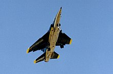 Underside view of a SAAF Mirage F1AZ flying overhead, 2002 SAAF Mirage F1AZ 233 (7839720362).jpg