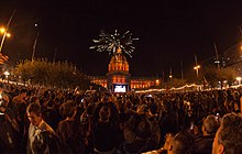 Fans celebrating the Giants' 2014 World Series victory at San Francisco City Hall. San Francisco Giants Fans Celebrating World Series Win 2014.jpg