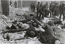 Polish Jews pulled from a bunker by German troops; Warsaw Ghetto Uprising, 1943 Stroop Report - Warsaw Ghetto Uprising 11.jpg