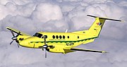 air-to-air sv:Svensk Flygambulans B200 over clouds