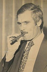 Ted Turner, c. 1976 Ted Turner smoking a cigar.jpg