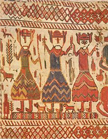 Three figures on the Skog tapestry; they have been interpreted as the Norse gods Odin (one eye), Thor (hammer in hand) and Freyr. Three kings or three gods.jpg