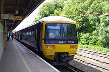 Redhill with the diesel Class 166 service run by First Great Western to Reading as the North Downs Line only has third rail electrification on shared sections. 166206 at Redhill.jpg