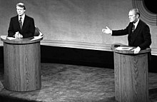 Carter and President Gerald Ford debating at the Walnut Street Theatre in Philadelphia, September 1976 Carter and Ford in a debate, September 23, 1976 (cropped).jpg