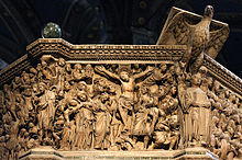 Crucifixion panel and eagle lectern from the Siena Cathedral Pulpit, by Nicola Pisano, 1268 Crucifixion panel from the Siena Pulpit.jpg