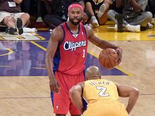 Davis with the ball, defended by Derek Fisher Derek Fisher defends Baron Davis.jpg