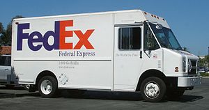 English: A FedEx Express delivery truck in a s...