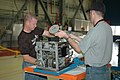 KSC-06pd0006 - Technicians working on fuel cell in OPF.jpg