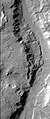 Section of Ma'adim Vallis as seen by HiRISE. A more recent flow of water may have formed the smaller, deeper channel to the right.