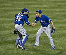Osuna celebrates his 20th save of the 2015 season with Russell Martin Roberto Osuna and Russell Martin.jpg