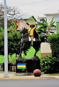 Horse with festival-goer statue in Hatillo barrio