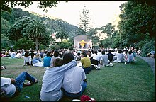 People watching outdoor performance