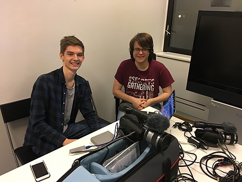 Volunteers setting up streaming for WMNO's general assembly