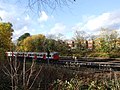 Metropolitan line train riding to the north of the park