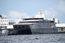 USNS Guam(T-HST-1) left front view at Port of Yokohama July 26, 2019 01.jpg