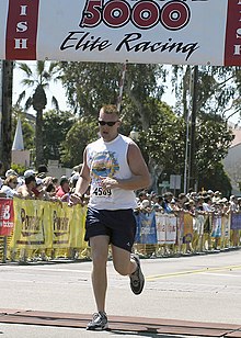 US Navy 040328-N-8977L-003 U.S. Marine Corps 1st Lt. David Cote, of Marine Medium Helicopter Training Squadron One Six Four (HMM-164), finishes the Carlsbad 5000 road race at about 25 minutes.jpg