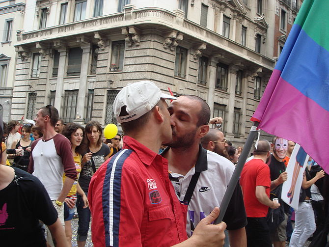 A kiss at the local Gay Pride march in Milan, ...