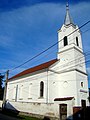 Biserica reformată datează din 1907, înlocuind o biserică de lemn construită în anul 1831