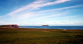 Paysage côtier de la péninsule avec la petite île de Lundey.