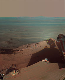 View over the Endeavour crater, imaged by Opportunity in March 2012. (False-color image) Late Afternoon Shadows at Endeavour Crater on Mars.jpg