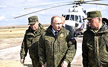 Sergei Shoigu, President of Russia Vladimir Putin and Chief of the General Staff Valery Gerasimov at the Center-2019 military exercises. Orenburg Oblast, 2019. Military exercises Center-2019-02.jpg