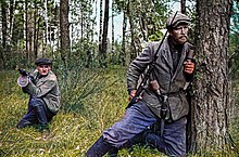 Soviet partisans in Belarus, 1943. Soviet guerilla-colored.jpg