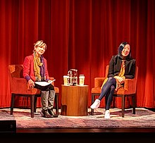 Lee (right) interviewed by Mina Morita, 2019