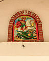 Икона на којашто е прикажан Свети Ѓорѓи како ја убива ламјата поставена над влезната врата од црквата