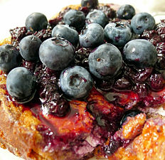 Blueberry-stuffed French toast, topped with wild Maine blueberry sauce and whole blueberries