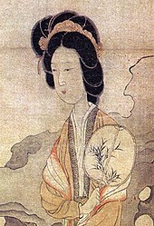 Appreciating Plums, by Chen Hongshou (1598-1652), showing a lady holding an oval fan while enjoying the beauty of the plum Chen Hongshou, Appreciating Plums, detail.jpg