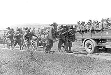 Italian Bersaglieri troops with artillery advancing to the front line, July 1942. Italian Bersiglieri in Russia 1942.jpg