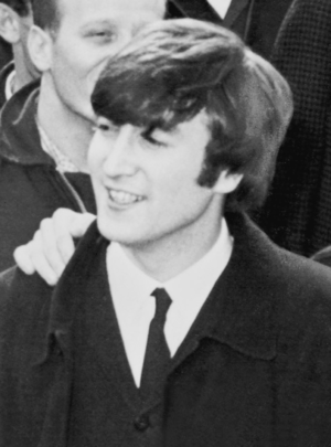 Photograph of John Lennon as The Beatles arriv...