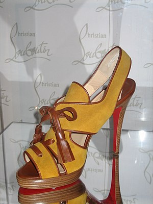 Christian Louboutin shoe at BATA Shoe Museum. ...