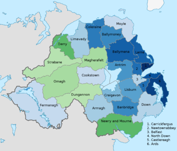 Map of districts of Northern Ireland colour coded to show the predominant national identity. Stronger green indicates a higher proportion of people describing themselves as Irish. Stronger blue indicates a higher proportion of people describing themselves as British. Data from 2011 census National Identity Northern Ireland Districts 2011 Census.png