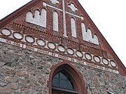 Gable with text from Psalms 84:10: "For a day in thy courts is better than a thousand elsewhere."